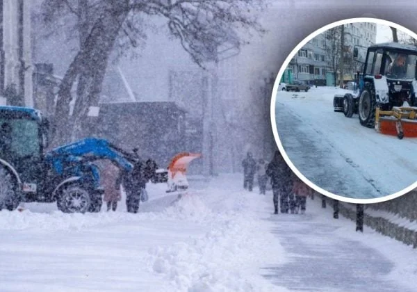 Снігоприбирання на засніжених вулицях Києва в холодний вівторок