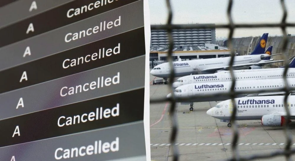 Табло аеропорту з Cancelled для рейсів Lufthansa та припарковані літаки компанії