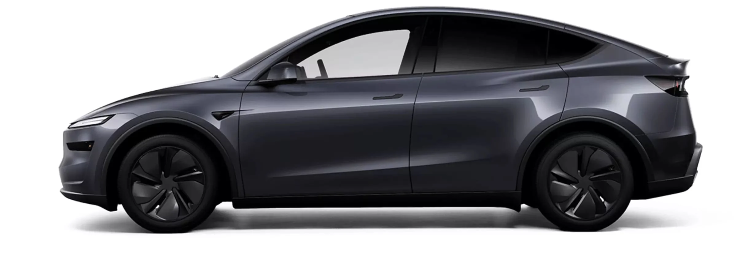 Сірий Tesla Model Y збоку, приклад компактного кросовера для нової моделі